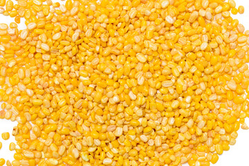 Peeled split mung bean isolated on white background.