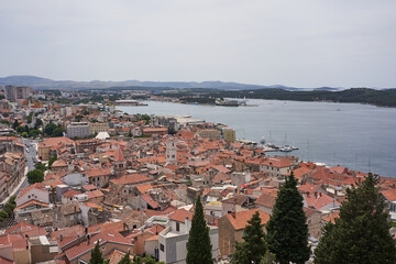 Naklejka na ściany i meble Sibenik, Croatia - May 26, 2022 - View of the town of Sibenik from the St. Michael's Fortress on a sunny spring afternoon