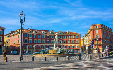 Sun Fountain (Fontaine du Soleil) and the Apollo statue on the Massena square in Nice, France