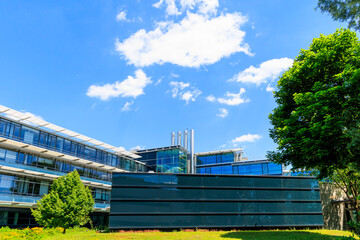 Modern facade of an office building under blue sky in Augsburg