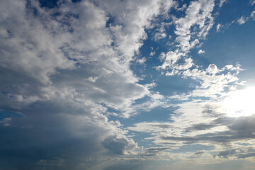 Fototapeta na wymiar Clouds on the blue sky in sunlight.