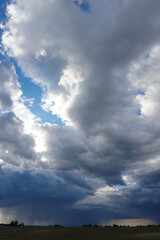 Fototapeta premium Clouds on the blue sky in sunlight.