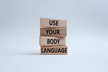 Use your Body Language symbol. Concept words Use your Body Language on wooden blocks. Beautiful...