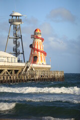 Fototapeta na wymiar lighthouse on the coast, halter skelter