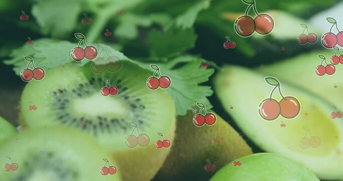 Animation of falling cherry over kiwi, avocado and parsley