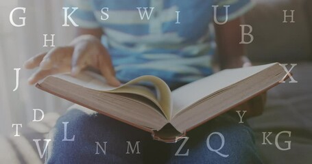 Animation of letters over african american schoolchild reading book - Powered by Adobe