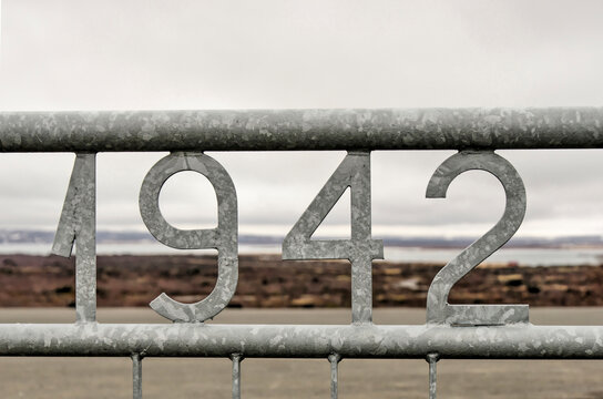 Reykjahlíð, Iceland, April 27, 2022: steel fence with the year 1942 at the entrance of the Dimmuborgir lavafield