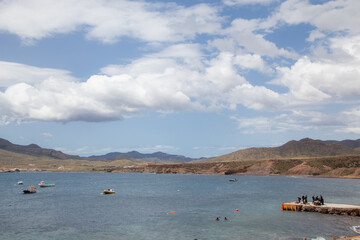 divers preparing to dive in the islet del moro