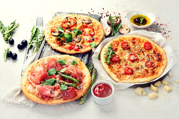 Set of delicious homemade pizzas.