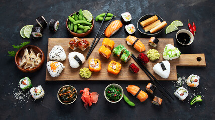 Japanese food assortment on dark background.