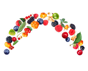 Various ripe berries in the air isolated on a white background