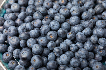 Blueberries background. Ripe and fresh blueberries. Vitamins. Healthy food. Juicy berry.Copy space.Place for text