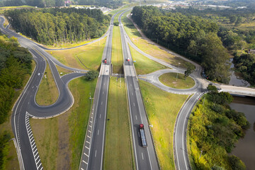 Aerial view of the Dom Pedro Highway in the city of Campinas. Road with lots of vegetation, trees...