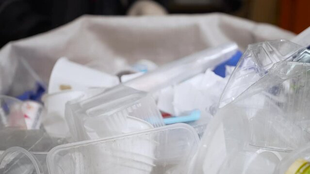 The process of sorting plastic garbage at the factory