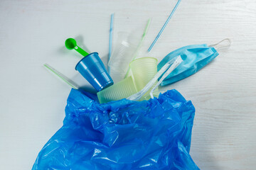 Garbage Waste, Plastic Waste Garbage, Plastic cups, straws, bag, medical mask Background, Plastic Pollution problem