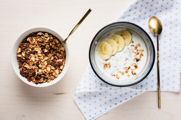 Granola with yogurt and bananas.