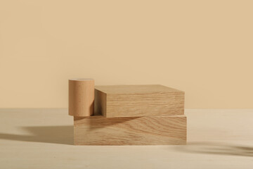 Minimalist wooden scene. Abstract minimal empty stage with rectangle podiums on beige background. Mockups display for product presentation.