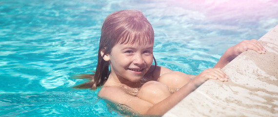 Kid in swimming pool. Kids summer vacation concept. Banner for design header, copy space.