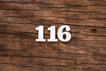 Number 116 - piece on rustic wood background