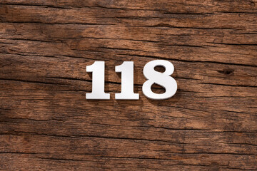 Number 118 - piece on rustic wood background
