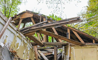 Broken destroyed old house in forest Germany.
