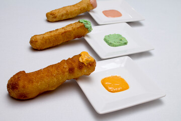 TEQUEÑOS WITH  GUASACACA (VENEZUELAN CHEESE STICKS WITH GREEN SAUCE)