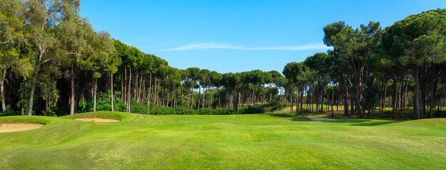 Golf course panorama with beautiful sky. Landscape view of golf course in Turkey Belek