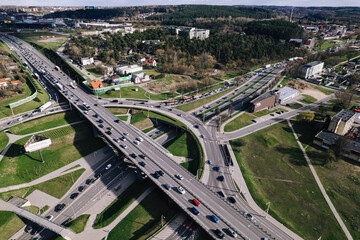 Fototapeta na wymiar Capital city round about and juncture roads from aerial perspective in urban environment