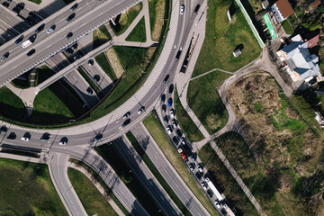 Capital city round about and juncture roads from aerial perspective in urban environment