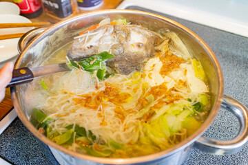 Close up shot of Taiwanese style boiled fish head