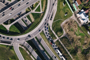 Capital city round about and juncture roads from aerial perspective in urban environment	