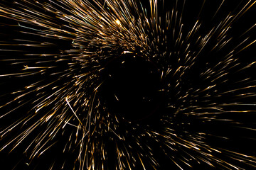  sparks in the dark. lines of light.