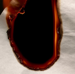 burning edge of paper, glowing edge of paper on black background