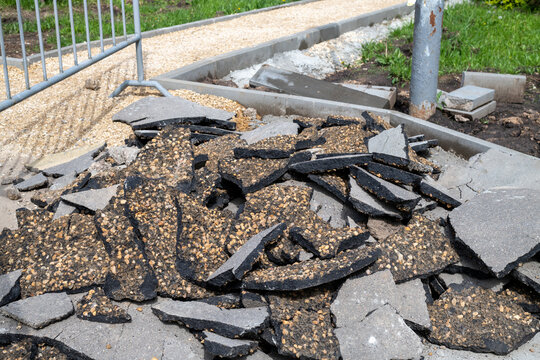 Road repair - pile of old asphalt. Moscow, Russia