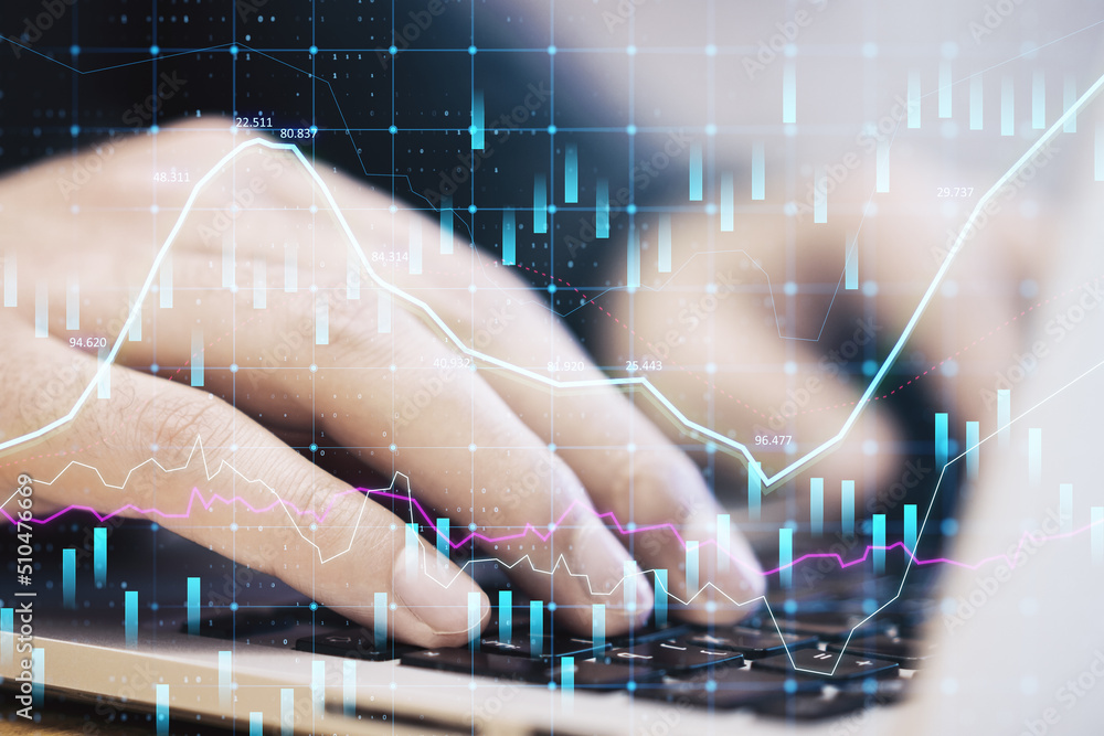 Poster Close up of hands using laptop keyboard on desktop with abstract glowing forex graph on blurry background with candlestick. Invest, trade and broker concept. Double exposure.