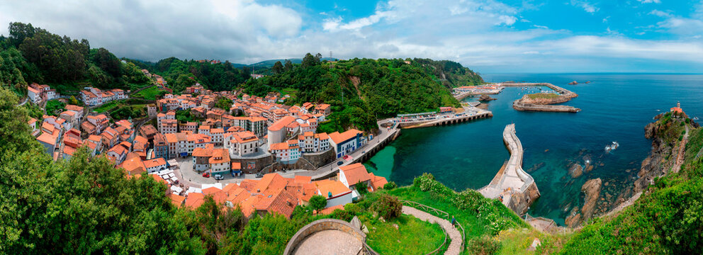 Panoramic view of Cudillero from the viewpoint of La Garita, town, port and lighthouse, Asturias.