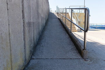 Fototapeta premium Accessible ramp for people with disability on wheelchair