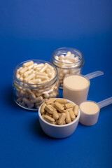 Food supplements and vitamins for people to protect health and immune system from negative negative impact of the environment. Different vitamins such as vitamin D, vitamin C, vitamin A, vitamin, zinc