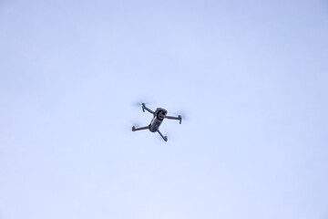 Small drone with good camera flying in the air for demonstration reference photo 