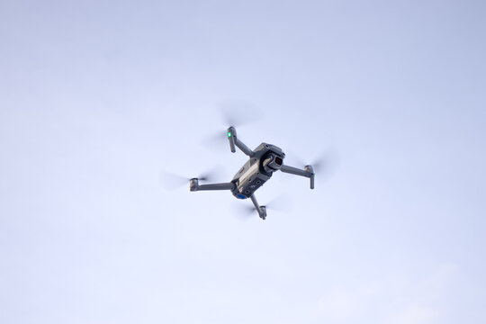 Small drone with good camera flying in the air for demonstration reference photo 
