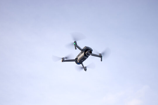 Small drone with good camera flying in the air for demonstration reference photo 