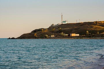fishing boats on the shore, Soft wave of the sea on the summer