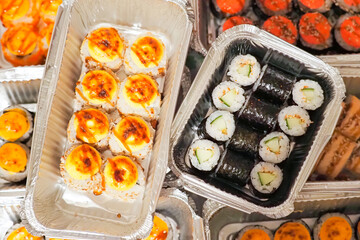 Japanese cuisine different rolls, maki, sushi. Various types of fresh sushi, top view