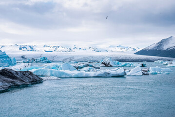 Idyllic view of icebergs floating in Jokulsarlon glacier lagoon. Beautiful view of glacial ice...