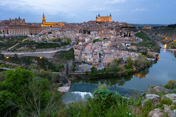 Fototapeta premium Evening photo of Toledo with view of Tagus River, Castilla-La Mancha, Spain.