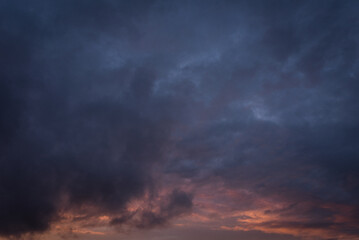 Fototapeta na wymiar Dark blue and pink sunset clouds