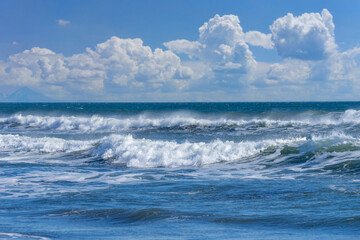 Seascape with big foamy waves