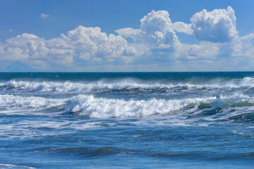 Seascape with big foamy waves