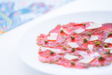 beef carpaccio recipe serve with cheese slides
