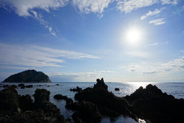 seascape with island in the sunlight